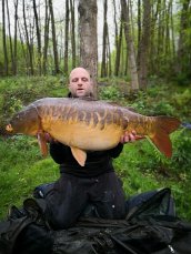Rick with a 53lb Mirror part of a monumental 4 fish catch!
